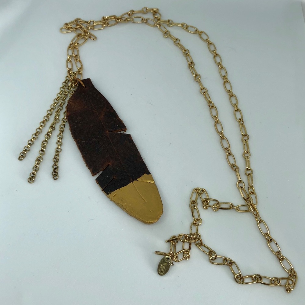 Leather and gold dipped feather necklace